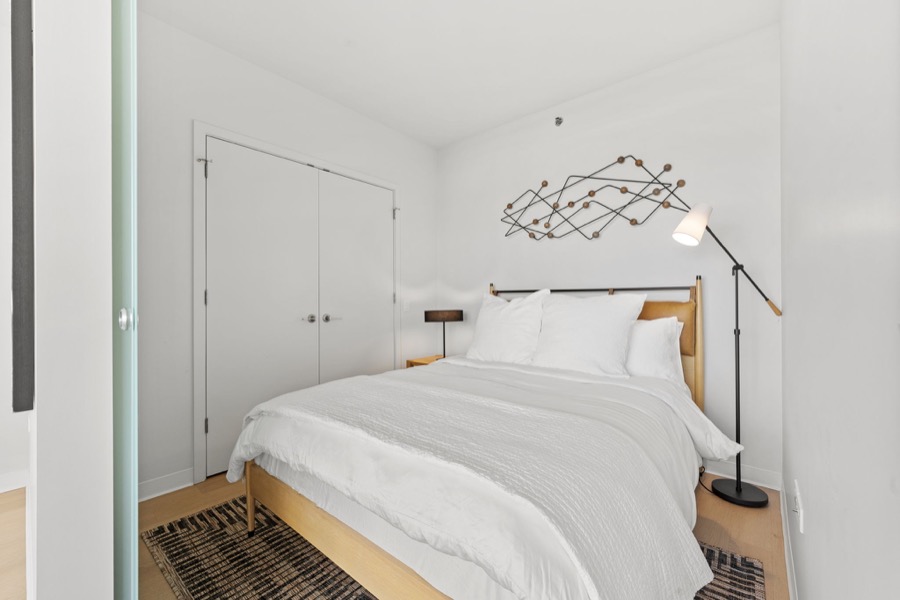 Bedroom with a leather headboard